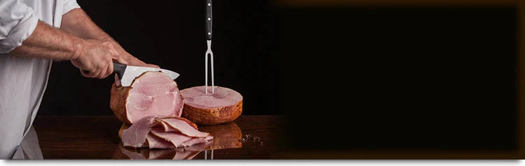 Butcher slicing one of Herterich's Premium Irish Hams