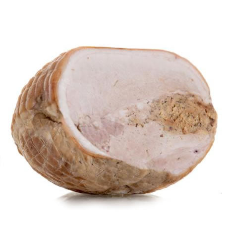 Herterich's cooked roast half leg of pork, with visible fat and skin, ready to be carved.