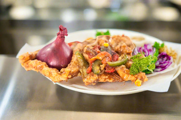 Cooked Teriyaki Crispy Chicken portion (500g) with Irish chicken, crispy coating, garden vegetables, and teriyaki sauce.