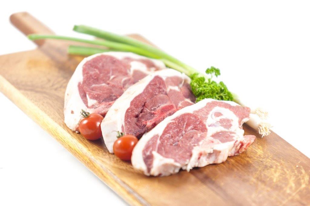 Three raw Side Loin Lamb Chops (rump chops), visibly meaty and succulent, ready for cooking.