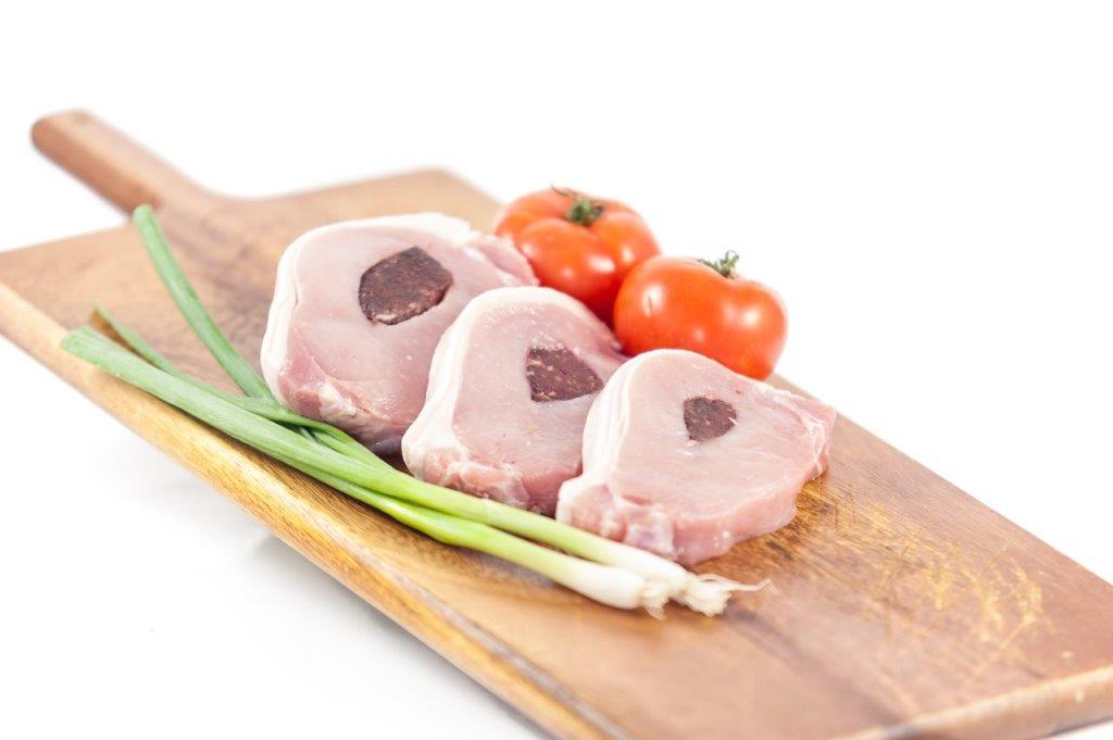 3 Herterich Black Pudding Pork Chops on a platter